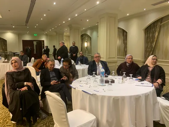 Participants listening to a presentation